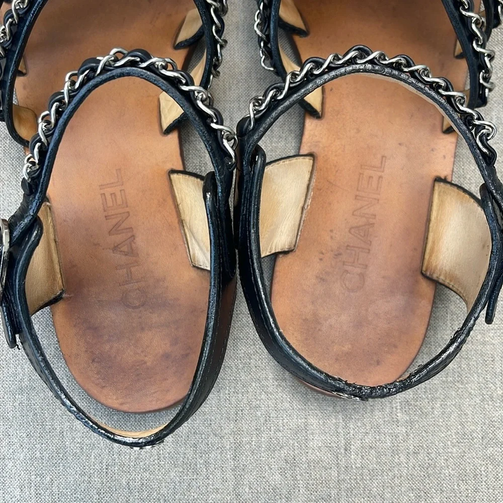 CHANEL Strappy Flat Sandal in Black Leather and Silver Chain Detail